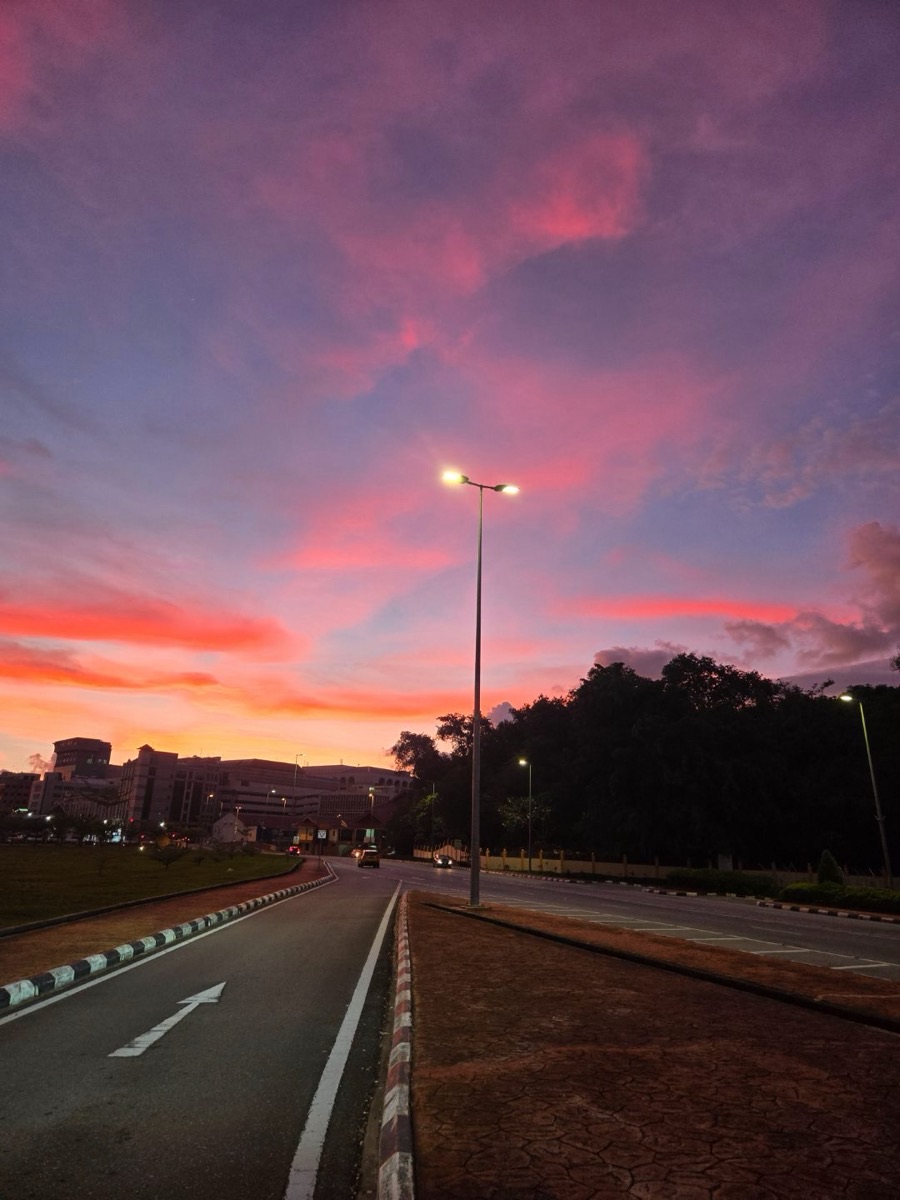 A quiet road at sunset, mid walk